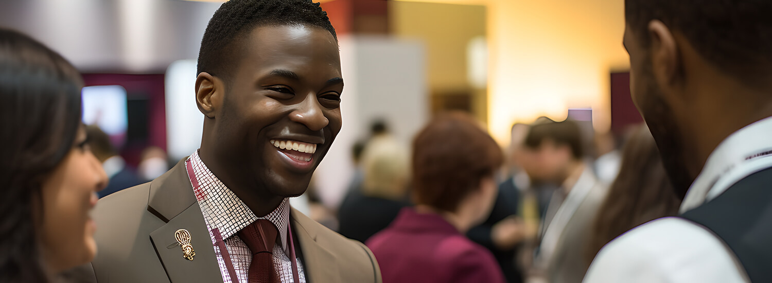 Group of well-dressed people smiling